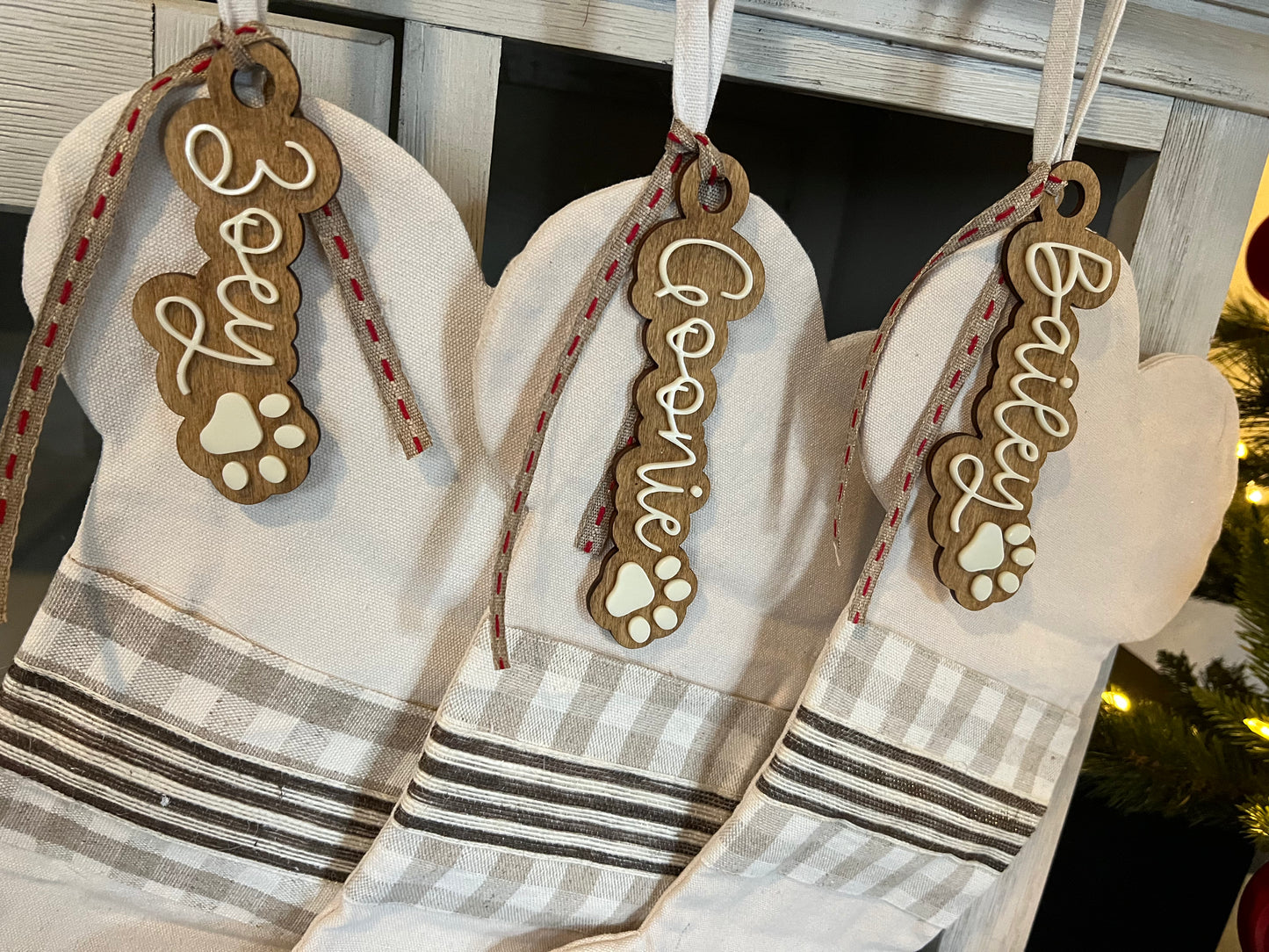 personalized wood and acrylic stocking tags in the shape of your name
