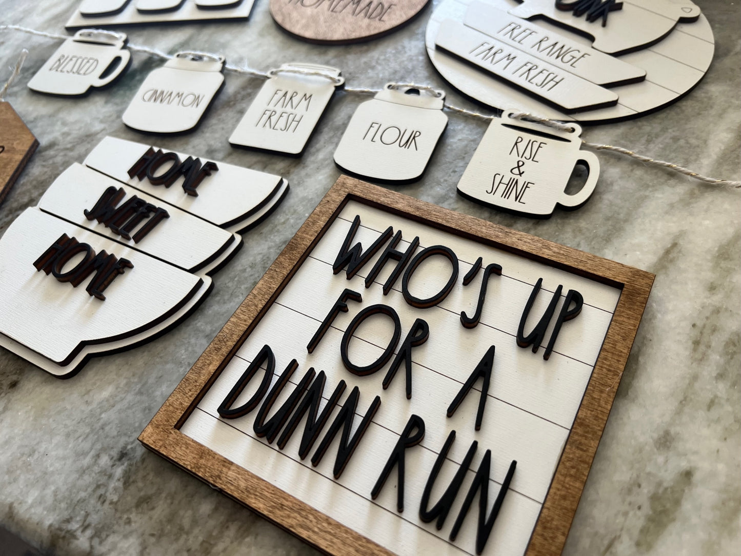 tiered tray set with a skinny font theme