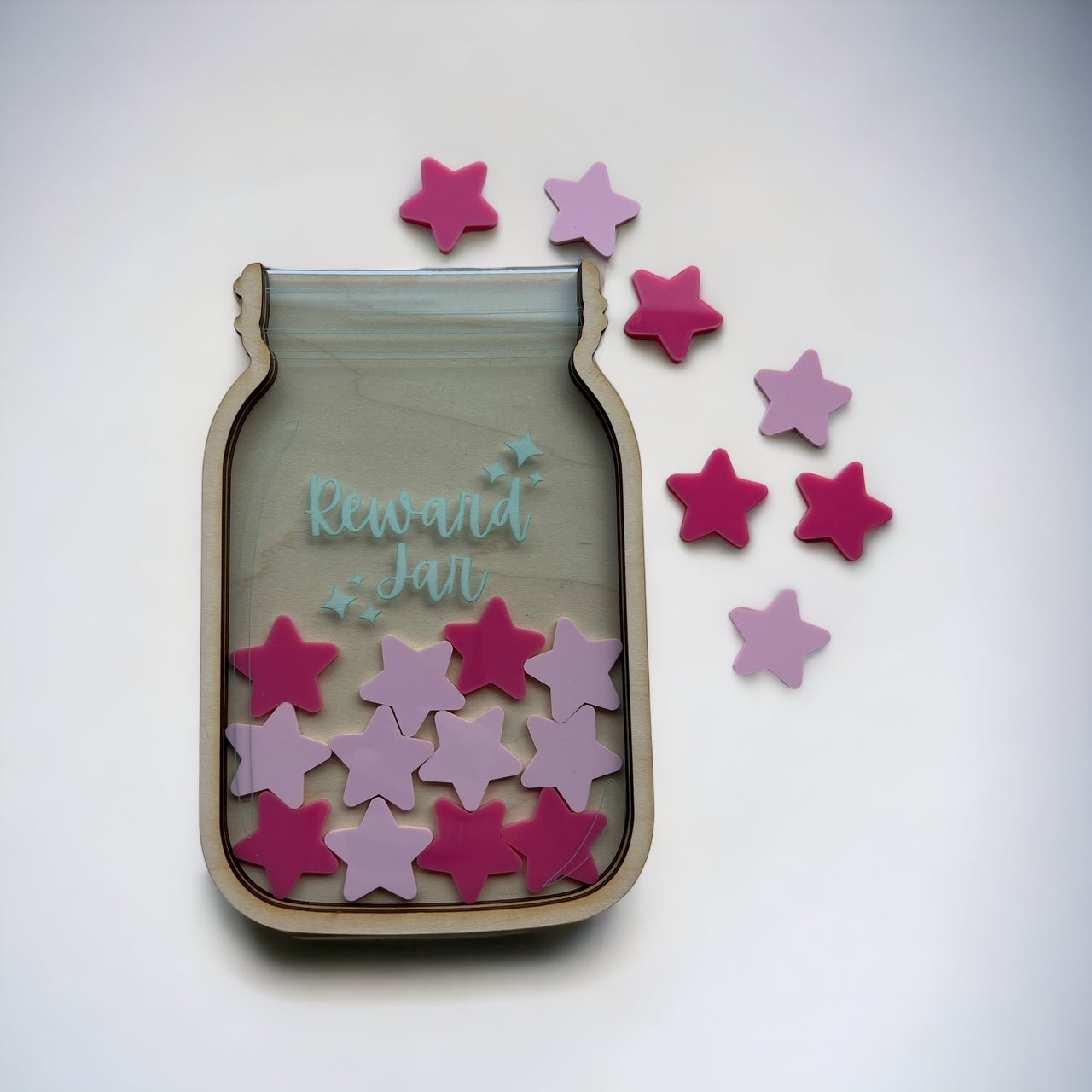 reward jar with light and dark pink star tokens
