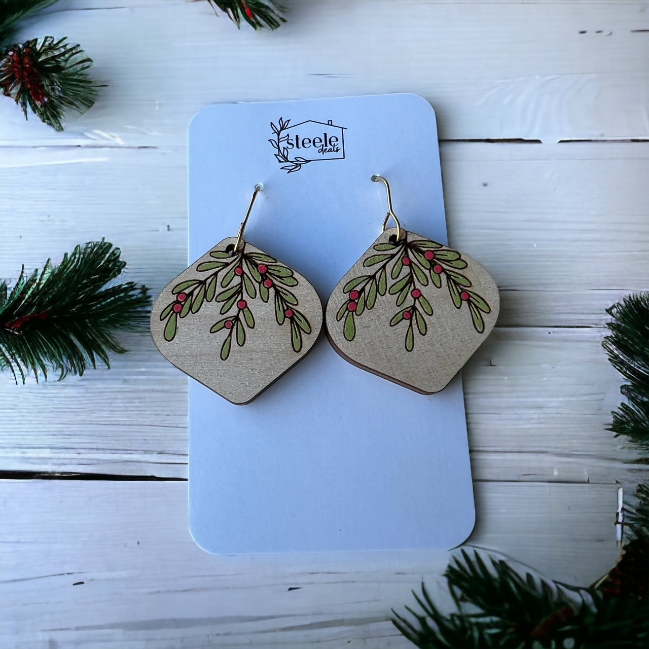 wood oblong dangle earrings with a hand painted holly berry design