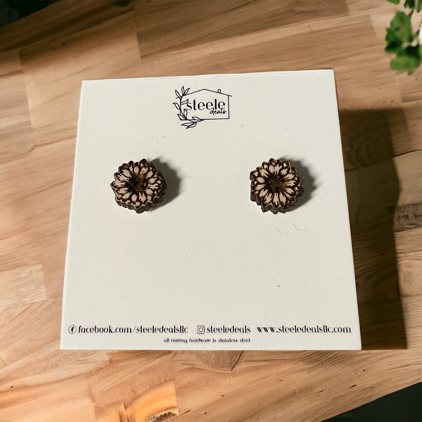 wood stud earrings in the shape of a flower