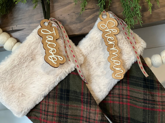 personalized wood and acrylic stocking tags in the shape of your name