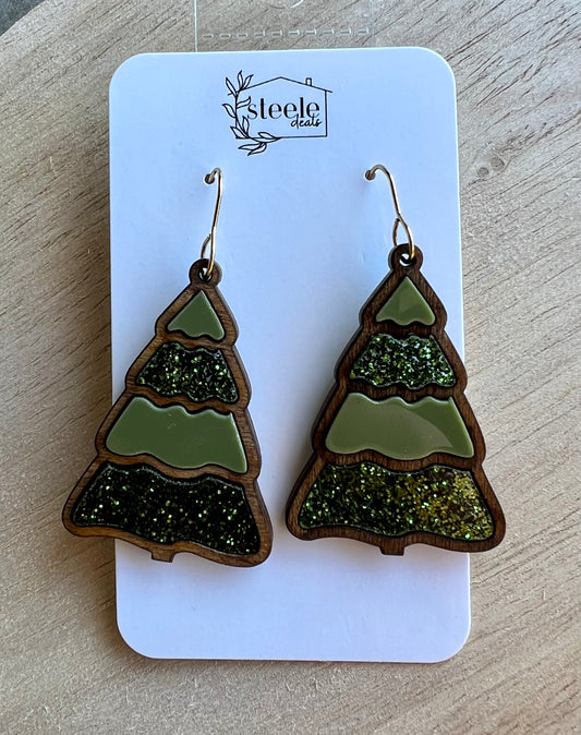 dangle earrings in the shape of a tree with a green and green glitter inlay deisgn