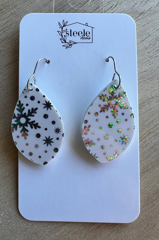 holographic snowflake pattern on dangle earrings
