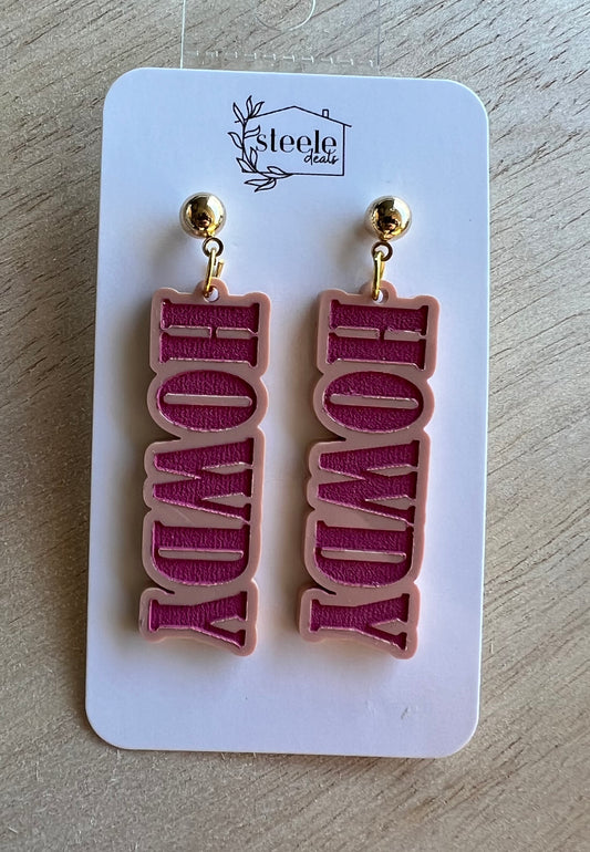 acrylic dangle earrings with a light pink design of HOWDY