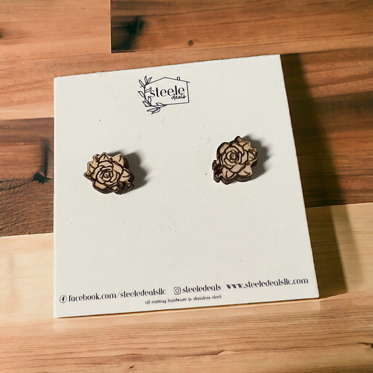wood stud earrings in the shape of a rose with leaves