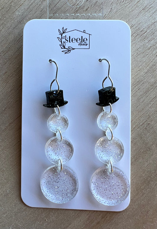 dangle acrylic earrings in the shape of a snowman