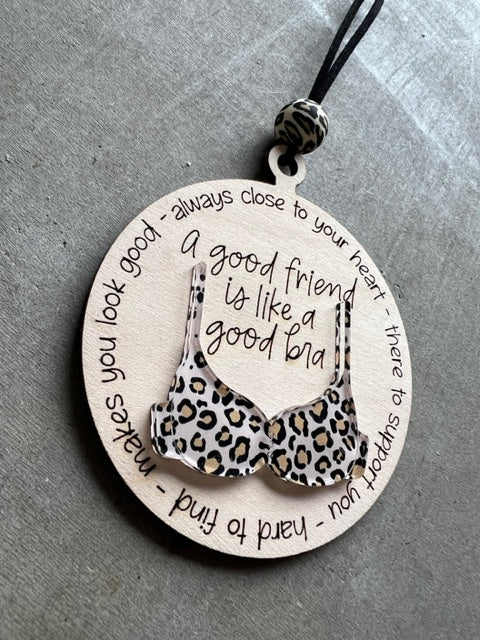 A good friend is like a bra ornament, bra is made with a leopard design