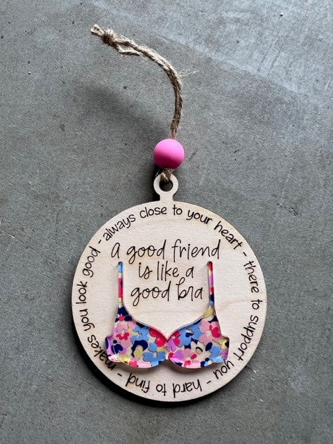 A good friend is like a bra ornament, bra has a pink floral design