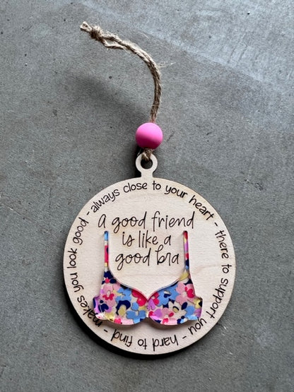 A good friend is like a bra ornament, bra has a pink floral design