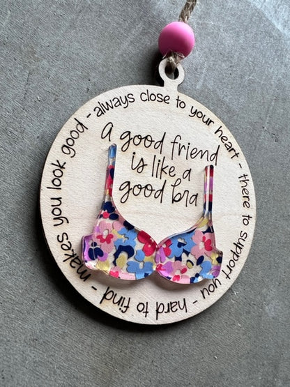 A good friend is like a bra ornament, bra has a pink floral design