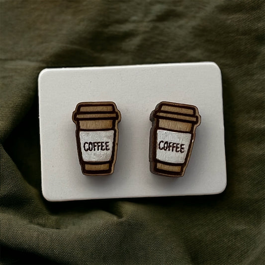 hand painted wooden studded earrings in the shape of a to go coffee cup