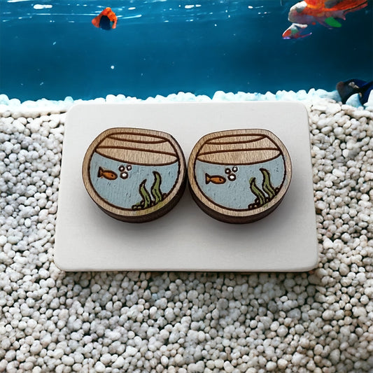 hand painted wood stud earrings in the shape of a fishbowl with a gold fish and sea weed design