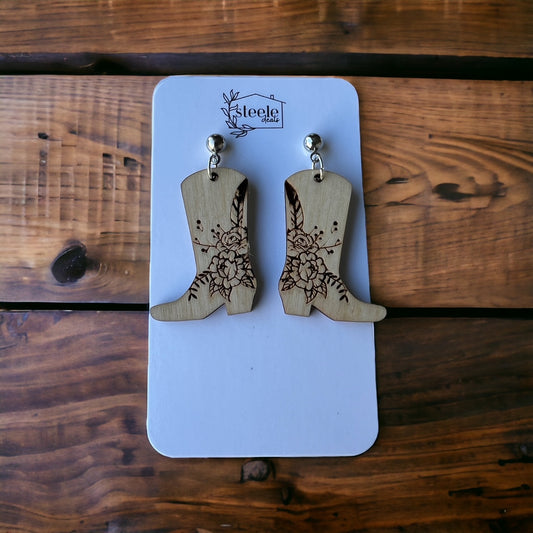 ball post dangle earrings with a wooden shape of a boot and laser floral design