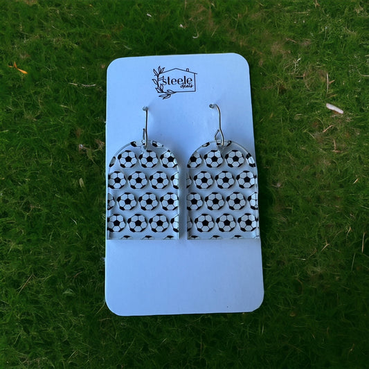 soccer pattern on arched dangle earrings