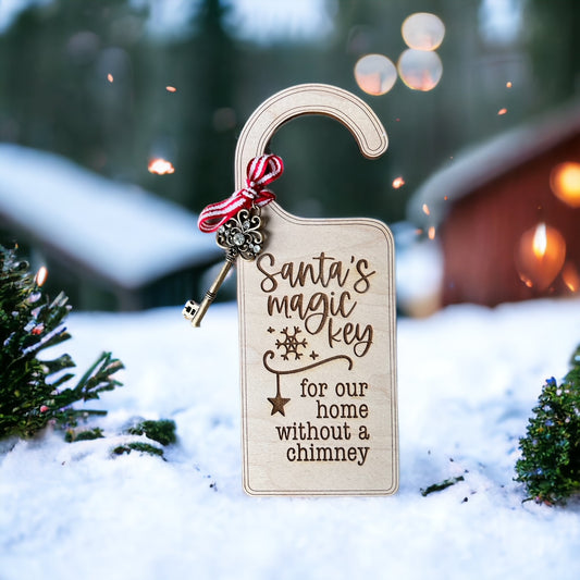 wooden door hanger with Santa's magic key for our home without a chimney